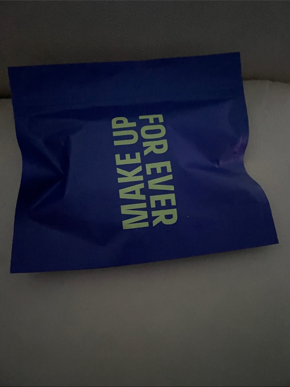 Make up For ever Blue Pouch with powder and lip gloss. BNWT